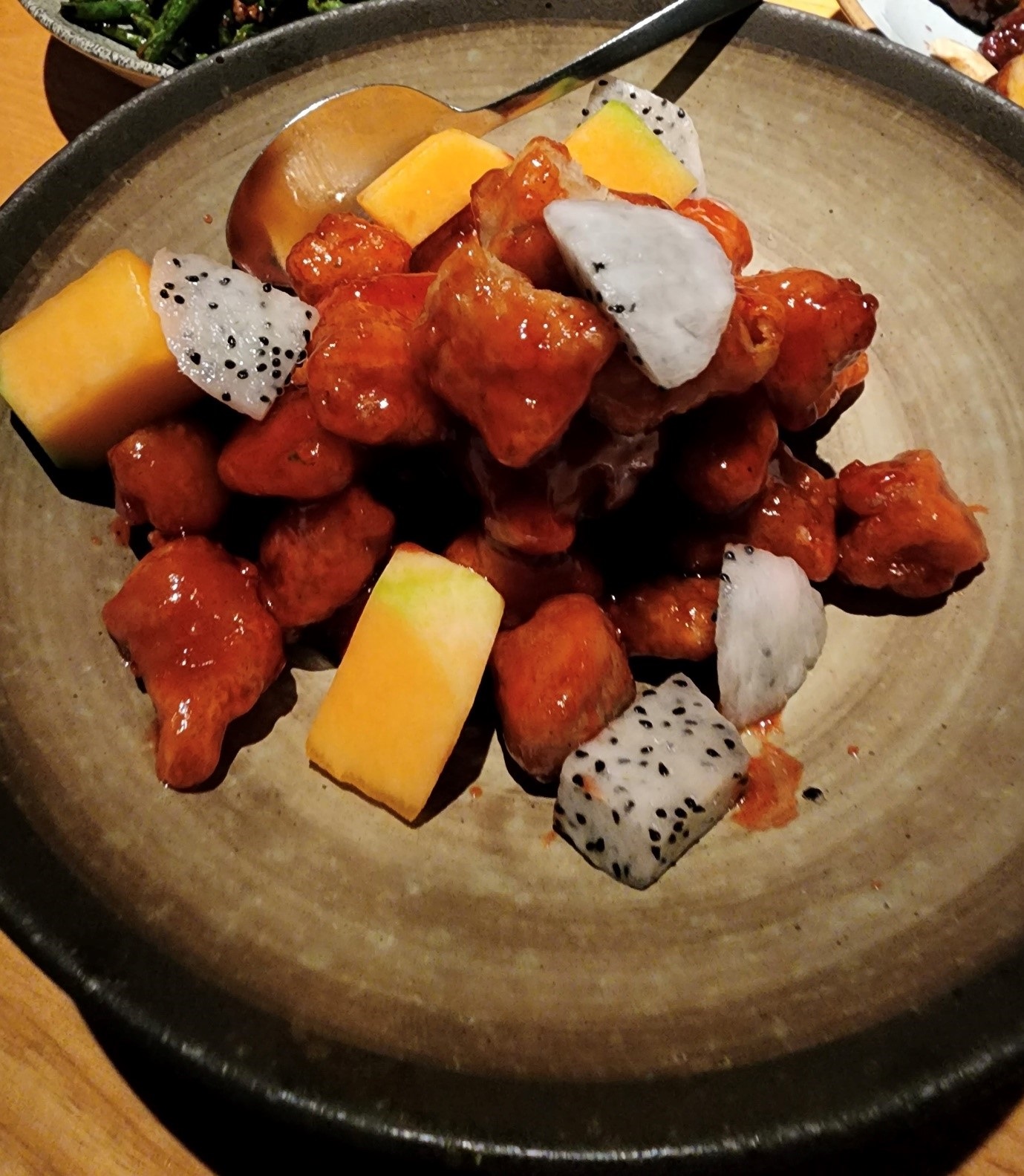 Wok-fried Sweet & Sour Pork with Rockmelon and Dragonfruit